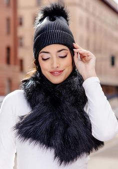 Crazy-cute and wearable, the Metallic Pom Hat is so cool, you'll wear it before the leaves fall. Why not -- in Metallic Black knit, it's stretchy and comfy. Better still, this substantial knit has recovery as well. Easy to pull on, the cap, when cuffed, measures 8" from the fur pom to the cuff fold. Ahhh, but the pièce de résistance is the oversize Black Fox pom. The magic of mixing Metallic knit with fur bestows a broad license to wear the Metallic Pom Hat with anything, everywhere. With denim, a fur jacket, or a cashmere overcoat, the Metallic Pom Hat is all in. Going to work, walking the dog, and for errands, the Metallic Pom Hat is perfect. When life happens, refresh our favorite hat with machine wash/cold/dry flat care. Warm Snug Hats For Fall, Super Soft One Size Beanie For Fall, Super Soft One Size Fall Beanie, Super Soft Fall Beanie, One Size Fits Most, Super Soft Beanie For Fall, One Size, Super Soft Beanie For Fall, One Size Fits Most, Solid Bonnet For Cold Weather, Solid Bonnet For Cold Weather One Size, Soft Knit One Size Bonnet For Fall