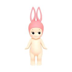 a small doll with pink hair and bunny ears on it's head, standing in front of a white background