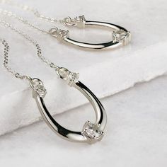 The URBAN-EQUESTRIAN Horseshoe Jewelry collection merges timeless elegance with equestrian heritage. Featuring intricately crafted horseshoe rings, bracelets, and necklaces, each piece showcases exceptional craftsmanship and modern sophistication. Add an equestrian touch to your look with these iconic designs. Silver Cowgirl, Equine Jewelry, Horseshoe Bracelet, Horseshoe Jewelry, Horseshoe Earrings, Equestrian Chic, Horseshoe Pendant, Chic Wardrobe, Horseshoe Necklace