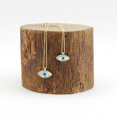 "Absolutely EYE catching! A beautiful mother of pearl with an inlaid evil eye. I paired this one with a beautiful beaded curb chain. This beauty will keep bad spirits at bay, and good ones in your corner! Enamel Evil Eye bracelet, Gold Evil Eye necklace, 925 Silver sterling, Handmade Jewelry Your choice Sterling silver with gold plated chain. *the chain and the rest of the metal components are gold plated *if you need longer chain can be upon request. Leave me a note on \"message to the seller\" Eye-shaped Amulet Necklace As Gift, Amulet Eye Necklace Gift, Symbolic Eye-shaped Jewelry Gift, Sterling Silver Evil Eye Jewelry For Good Luck, Evil Eye Jewelry Gift, Spiritual Eye-shaped Necklace For Gift, Spiritual Sterling Silver Evil Eye Necklace, Sterling Silver Evil Eye Jewelry For Gifts, Sterling Silver Evil Eye Necklace For Gift