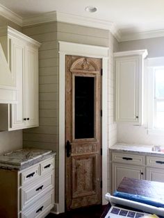 the instagram page on instagram com shows an image of a kitchen with white cabinets and marble counter tops