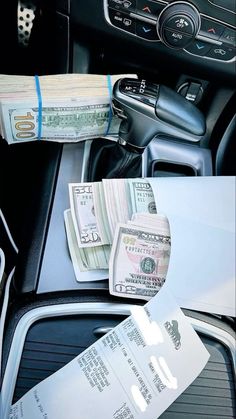 the inside of a car with money in it