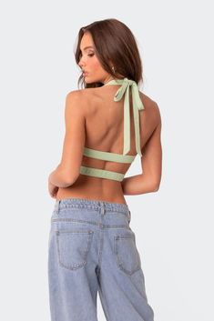 PRODUCT INFO Top Halter neck tie Back double strap Side waist cut outs Tie front detail Triangle shaped fit Cotton, Polyester, Spandex Model wears size S Model height is 5'8 Item care: Wash with similar color Sophia Richie, Aritzia Tna, Top Halter, Cut Out Top, Going Out Tops, Oversized Top, Cut Out Design, Triangle Shape, Tie Back