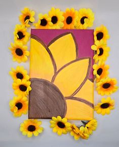 a painting with sunflowers surrounding it