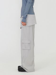 This is a modern and casual cargo pants by DIAGONAL that is made out of high quality and sturdy fabric. With unique design detail and trendy mood, you can style it for your clean and casual daily outfit.- Detachable skirt layered- Cargo pockets detail- Logo string on the hem- Logo snaps and YKK zipper Gray Spring Cargo Pants With Multiple Pockets, Gray Utility Cargo Pants For Spring, Spring Gray Utility Cargo Pants, Gray Cargo Bottoms For Workwear, Gray Cargo-style Techwear Bottoms, Gray Cargo Style Parachute Pants For Spring, Gray Cargo Techwear Bottoms, Gray Techwear Cargo Bottoms, Functional Gray Cargo Bottoms