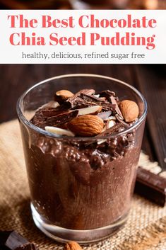 the best chocolate chia seed pudding in a glass with almonds and cocoa on top