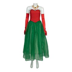 a mannequin wearing a green dress and red gloves