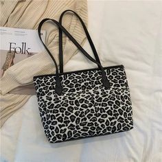 Animal Print Tote Bag with Zipper – Women's Tote Bag – Tristar Boutique Daily Use Animal Design Tote Shoulder Bag, Animal Design Tote Shoulder Bag For Daily Use, Large Capacity Leopard Print Bag For Shopping, Animal Design Tote Bag For Daily Use, Trendy Animal Design Bags For Daily Use, Daily Use Tote Bag With Animal Design, Leopard Print Travel Bag With Animal Design, Rectangular Leopard Print Shoulder Bag For Daily Use, Large Capacity Leopard Print Tote Shoulder Bag