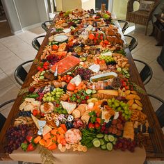 a long table filled with lots of different types of food