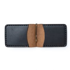 A Slim Leather Wallet that's Built for Cash and Cards. This wallet securely holds bills and cards while maintaining a slim profile, perfect for front-pocket carry. Quickly flip through your cash without having to remove your entire stack of bills. The solid brass spring bar clip ensures your money is secure and stays in your pocket.Our full-grain leather means your wallet will develop character and patina. We hand-sew this wallet with thick Tiger Thread so it will never unravel or come apart.The Horween Chromexcel, Black Money, Leather Money Clip Wallet, Leather Money Clips, Slim Leather Wallet, Engraved Initials, Horween Leather, Clip Wallet, Money Clip Wallet