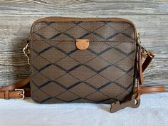 "It is a pre owned vintage FOSSIL bag and shows signs of wear.  The exterior does come with scuffing some surface scratches from normal used. The inside looks clean and undamaged. The hardware is functional.     The bag is in very good overall used condition. Bag length 8\" Bag height 6.5\" Bag depth 2\" Strap drop 26\"max. FREE DOMESTIC SHIPPING Please view the photos to evaluate the condition. Any questions regarding an item, please ask prior to making your purchase. All sales are final. No refund will be issued. Each item will be shipped using delivery confirmation." Dark Brown Leather Bag, Y2k Shoulder Bag, Shoulder Bags Pattern, Fossil Bags, Brown Shoulder Bag, Brown Leather Bag, Brown Purses, Genuine Leather Bags, Leather Hobo