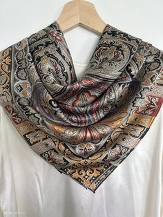 "Elegant, versatile multi color artistic print natural mulberry silk large square scarf with size of 110 cm x 110 cm / 43 in x 43 in. Quality silk fabric and fine print, hand rolled edges, smooth and lustrous silk charmeuse, shines subtly, breathable and skin-friendly feels very soft and comfortable to wear. Can style in many ways: wear the scarf as a large neck scarf, as an evening shawl and cover up, as a large hair scarf, as a head scarf, ...or style it any way you want with your own sense of creativity! Suitable for all seasons and is a wonderful gift idea for special occasions. Care Instructions: Pure silk is a type of organic and natural fabric, please avoid washing. Dry clean recommended. Stored in a cool, dry, and dark place.  Iron reverse side on silk setting acceptable.  Please f Luxury Zari Work Silk Scarf, Luxury Traditional Katan Silk Scarf, Bohemian Silk Square Scarf, Bohemian Paisley Print Patterned Silk Scarf, Bohemian Paisley Print Silk Scarf, Elegant Patterned Silk Scarf With Paisley Print, Elegant Paisley Print Silk Shawl, Multicolor Silk Scarf With Paisley Print, Elegant Patterned Silk Shawl Scarf