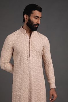 This beige Georgette embroidery Mens Custom fit kurta Pajama set is made with high-quality georgette fabric and intricate chikan embroidery for a luxurious look and comfortable wear. Perfectly tailored to your size, you'll love the way you look in this stylish and timeless design. We provide any customization color size for Customer requirement according so any your requirement contact Us feel free.. The garment should always be dry-cleaned only NOTE: All our items are handmade and specially customized for our beautiful customers. Please expect minor variations in the actual product as compared to the image displayed. We make it exclusively using similar fabrics. Product color may slightly vary due to photographic lighting sources or your monitor settings. Order will not be canceled once p Chikankari Kurta Set, Wedding Kurta For Men, Chikankari Kurta, Kurta Set For Men, Kurta Men, Mens Kurta Designs, Indian Kurta, Kurta Pyjama, Indian Wedding Wear