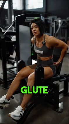 a woman sitting in a gym chair with her legs crossed and the words glute above her