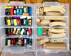 two clear bins filled with lots of wooden toys