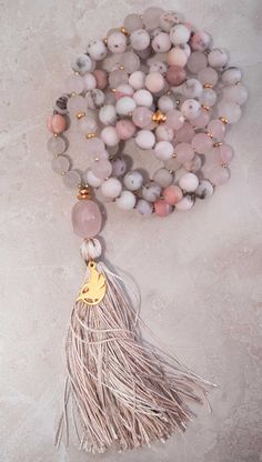 WERKSHOP X Element of Sri | 108 Matte Peruvian Pink Opal and Madagascar Rose Quartz Mala (Prayer Beads) ◇ Handmade in Seattle, Washington by our friend Kenny @ of Element of Sri◇ Embellished with a WERKSHOP logo charm w/handmade silk tassel◇ Gold tone hardware◇ Shipped in a keepsake WERKSHOP Canvas Drawcord PouchEach mala is hand created with the purpose of respecting the balance of energies we all exchange. In order to ensure only the best of intentions make it to your practice, Element of Sri Rose Quartz Mala, Positive Intentions, Om Shanti, Eagle Rock, Athleisure Leggings, Reversible Top, Athleisure Tops, Spiritual Energy, Clear Mind