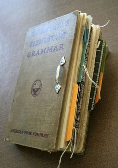 an old book sitting on top of a table