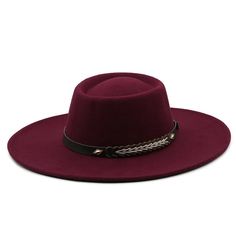 Elevate your look with our fashionable Fedora Hat, a timeless accessory that adds sophistication and charm to any outfit. Crafted with meticulous attention to detail, this classic Fedora boasts a sleek and structured silhouette, perfect for both men and women alike. Key Characteristics: Sleek Design: The hat boasts a sleek and modern design, perfect for urban settings and stylish city dwellers. Versatile Fashion Accessory: This Fedora hat is a versatile fashion accessory that effortlessly complements a wide range of outfits, from casual streetwear to more formal attire. Urban Chic: With its combination of classic Fedora style and contemporary urban aesthetics, this hat embodies urban chic and sophistication. Comfortable Fit: Designed for comfort, the hat provides a snug yet comfortable fit Chic Flat Brim Top Hat For Fall, Chic Fall Top Hat With Flat Brim, Chic Fall Top Hat With Short Brim, Adjustable Formal Felt Flat Cap, Chic Fall Fedora Top Hat, Burgundy Flat Brim Felt Hat For Fall, Red Wide Brim Hat For Fall, Red Flat Brim Hat For Fall, Burgundy Brimmed Fedora For Fall