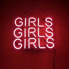 a neon sign that says girls girls girls