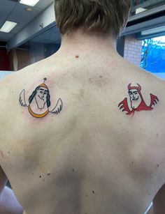 two tattoos on the back of a man's upper and lower body, one with an angel and another with a devil