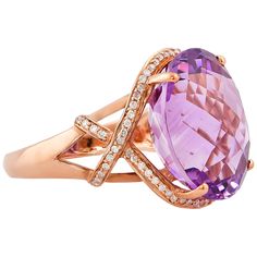 Sunita Nahata presents a collection of alluring amethyst cocktail rings. Amethysts are particularly known to bring powerful energies to Aquarians or those born in February. In general it is said to calm and de-stress wearers, and alleviate all negativity. These pieces are given a classical design touch to enhance the sophisticated tones of this stylish gemstone. This particular ring features a gorgeous 18 carat oval shaped gem with a unique checkerboard cut to bring out a sparkle from its pleasi Luxury Elegant Gold Amethyst Ring, Luxury Purple Rings With Rose Cut Diamonds, Luxury Elegant Rose Gold Amethyst Ring, Amethyst Cocktail Ring, Born In February, Gold Amethyst Ring, Amethyst Ring Engagement, Purple Amethyst Ring, Amethyst Gem