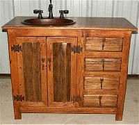 a bathroom vanity with wooden drawers and a sink