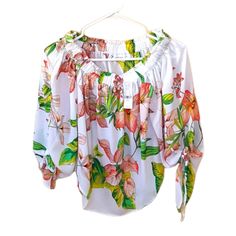 White With Green And Orange Red Floral Pattern Spring Printed White Blouse, Printed White Blouse For Vacation, White Printed Blouse For Vacation, White Blouse For Spring Vacation, White Blouse For Vacation In Spring, White Fitted Printed Blouse, White Floral Print Top For Day Out, Fitted White Printed Blouse, Red Floral Pattern