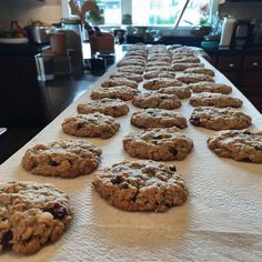 cookies are lined up on a table ready to be baked in the oven and eaten