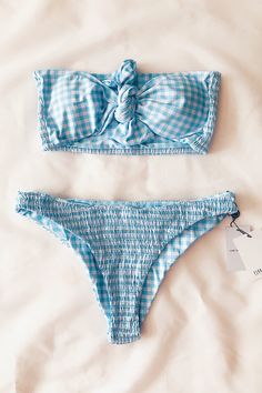 Blue white gingham print Worn mid or high-rise High-leg cut Ruche fabric Cheeky coverage Summer Gingham Beachwear Bottoms, Summer Gingham Bottoms For Poolside, Summer Beachwear Gingham Bottoms, Gingham Beachwear Bottoms For Summer, Casual Gingham Swimwear For Summer, Cotton Gingham Swimwear For Summer, Cotton Gingham Swimwear For The Beach, Summer Gingham Bottoms For Beach Season, Beachwear Gingham Bottoms For Poolside