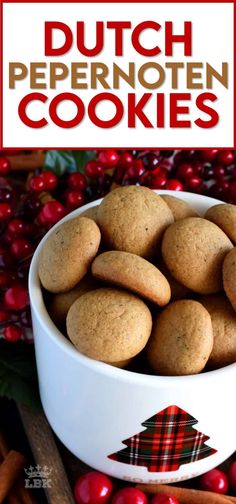 a white bowl filled with cookies on top of a table