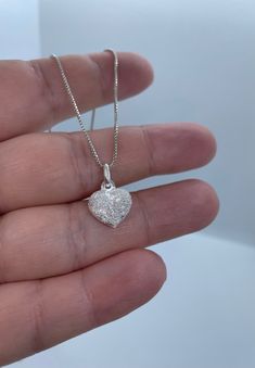 This beautiful heart charm necklace makes a perfect gift for that special person in your life and also a great gift for lovers of modern and minimalist jewelry. 💕 Approximately 1mm box chain (choice your length) Pendant  Height: 10.7mm Width: 11.8mm Thickness: 4.4mm Bail opening: 4mm Metal: 925 Sterling Silver ⭐️Free silver polishing cloth  ⭐️ It's completely natural for sterling silver to oxidize over time when it's exposed to air. Please, keep them in airtight plastic bag and use sterling sil Gift Heart Pendant Jewelry With Box Chain, Valentine's Day Heart Pendant Necklace With Box Chain, Valentine's Day Heart Necklace With Box Chain, Silver Heart Necklace With Box Chain Gift, Heart Pendant Necklace With Box Chain As Gift, Heart Pendant Necklace With Box Chain For Gift, White Gold Charm Necklaces With Box Chain For Gift, Silver Heart Necklace With Adjustable Chain As Gift, White Gold Charm Necklace With Box Chain As Gift