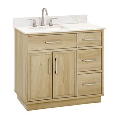 a bathroom vanity with two sinks and no cabinet doors on the front, in light wood