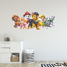 the paw patrol wall decals are hanging in a child's room