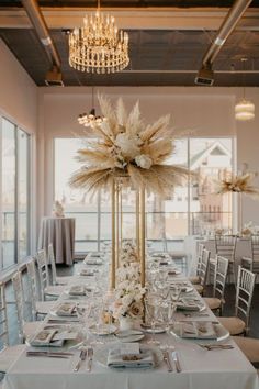 These beautiful Centerpieces for you special day.  This centerpiece will include the following:  50 pcs pampas Grass (these will need to be fluffed upon receipt!) 12pc Ivory rose silk floral stems 6 stems of baby breaths 1 x Foam Cup and a 32" Or 24"  Flat Gold stand (Choose the color drop down menu) Needs to be assembled upon arrival!  Just note the height may vary depending how you arrange the pampas! and the size of stand you select.  not all arrangements, will look as the listing as you are Pampas Grass Centerpieces, Grass Centerpieces, Loft Wedding Reception, Pampas Arrangement, Beautiful Wedding Decor, Grass Centerpiece, Tafel Decor, Loft Wedding, Beige Wedding