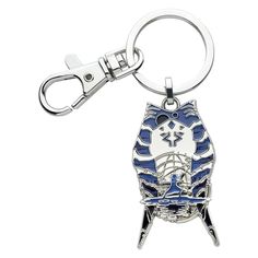 a metal keychain with a blue and white design on it