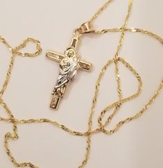 14k Real Solid 2 Tone Gold Cross San Judas Religious CZ White Stone Pendant-Z2909 Chain: 14k real Solid Yellow Gold 16",18",20",22",24"-1.2mm Pendant:     Material Type: 14k Gold     Bail Size: 2 mm     Average Weight:  1.3 g     Height:   30 mm     Width:    16 mm Yellow Gold Crucifix Necklace With Diamond Cut, 14k Gold Crucifix Necklace With Diamond Cut, Gold Crucifix Necklace In 14k Gold, 14k Gold Diamond Cut Crucifix Necklace, 14k White Gold Crucifix Necklace, Yellow Gold Diamond-cut Crucifix Necklace, Gold Crucifix Necklace With Diamond Cut, Jesus Christ Art, Christian Things