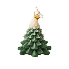 a green and white christmas tree ornament with a bell on it's top