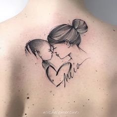 the back of a woman's shoulder with a drawing of a mother and child on it