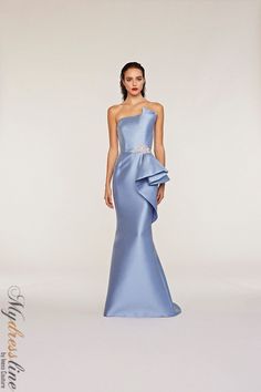 Looking for a show-stopping gown for your next big event? Check out the Frascara 4232 Strapless Gown! This gorgeous dress features an asymmetrical sculpted bodice and peplum, plus a beaded rhinestone applique at the waist. The fit and flare silhouette is flattering on any figure, and the hidden back zipper makes it easy to slip on and off. Plus, the satin lining ensures a comfortable fit all night long. 87% polyester, 13% silk. Gowns Red Carpet, Entourage Gowns, Modern Dresses, Silk Evening Dress, Evening Wear Dresses, Event Stand, Bride Groom Dress, Strapless Neckline, Taffeta Dress