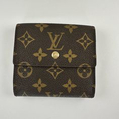 This Is A Preloved Item. Authentic Vintage Louis Vuitton Monogram Elise Wallet Comes With Coa This Lv Wallet Is A Timeless Classic And Is In Excellent Used Condition. The Money Compartment Was Peeling. I Cleaned That And Painted It Black. Single Snap Closure On Both Sides (And Both Snaps Work); 4 Card Slots; Two Flat Pockets Behind The Card Slots; 1 Money Compartment; And 1 Change Compartment. Approximately 4.5" X 3.5" When Folded. Date Code: Th0975 Please Look Closely At The Photos As They Are Classic Wallet In Monogram Canvas With Original Box, Classic Monogram Canvas Wallet, Elegant Monogram Canvas Wallet Gift, Lv Wallet, Vintage Louis Vuitton, Me Clean, The Money, Timeless Classic, Snap Closure