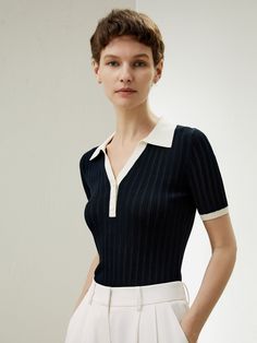 Crafted from 100% machine washable spun silk, this knit polo t-shirt has a slim fit for a figure-flattering silhouette. Its contrasting trim adds a touch of delicacy to it. The stretchy knit takes you from business to sports and everything in between. Luxury Collared Tops With Ribbed Cuffs, Luxury Short Sleeve Tops With Ribbed Collar, Luxury Short Sleeve Top With Ribbed Cuffs, Luxury Tops With Seamless Collar And Short Sleeves, Luxury Knit Tops With Collared Neckline, Luxury Casual Tops With Ribbed Collar, Luxury Casual Tops With Ribbed Cuffs, Affordable Stretch Collared Tops, Luxury Fitted Collared Shirt