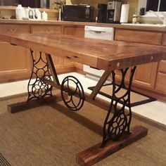 an old fashioned sewing machine table in a kitchen