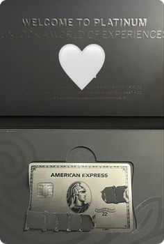 an american express credit card with a heart on the front and back side is shown