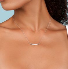 This curved bar pendant adorned with diamonds beautifully adds a touch of elegance to your collection. Curved Bar, Diamond Bar, Bar Pendant, Natural Diamonds, Diamonds, Bar, Pendant, Yellow, Beauty