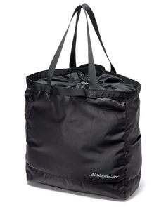 Great for everyday use and travel, this roomy tote has an adjustable cord-lock closure and packs into its own zippered pocket when not in use. Black Tote Travel Bag For Outdoor Activities, Black Tote Box Bag With Adjustable Strap, Black Tote Bag For Outdoor, Black Waterproof Tote Bag, Black Gym Bag With Zipper Closure For Outdoor, 20l Backpack, Flat Twist Updo, Natural Hair Accessories, Twisted Updo