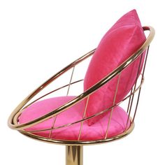 a pink chair sitting on top of a metal stand