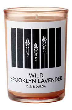 a candle that is sitting in front of a white background with the words brooklyn lavender on it