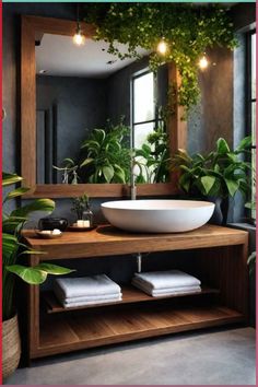 a bathroom sink sitting under a mirror next to plants