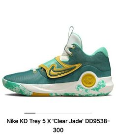 Elevate your basketball game with the Nike KD Trey 5 X sneakers in Clear Jade/Geode Teal/Sail/Vivid Sulfur. These sneakers are part of the Nike KD product line and are designed for athletic performance on the court. The mid-top shoe shaft style and standard shoe width provide a comfortable fit, while the synthetic upper material ensures durability. These sneakers feature a unique blue color with accents of green and yellow. The theme of basketball is evident in the Style Code DD9538-300 and the Mid Top Shoes, Volleyball Shoes, Mid Top, Athletic Performance, Jade, Athletic Shoes, Sailing, Basketball, Men's Shoes