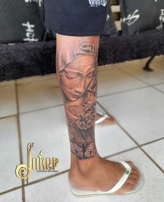 a person with a tattoo on their leg